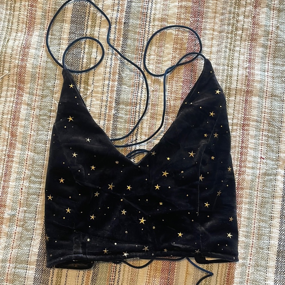Romwe top in size S. Dark blue with gold stars and a corset-esque back :)